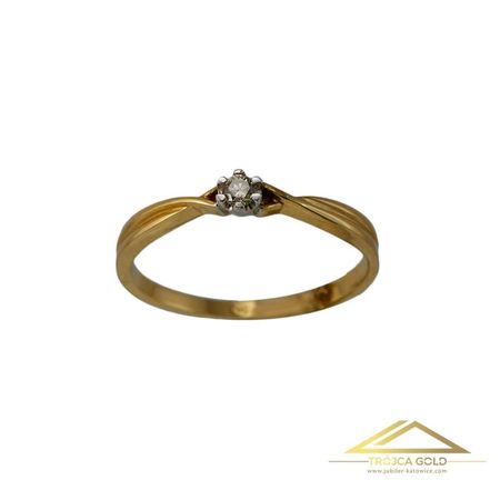 Złoty pierścionek z brylantem o masie 0,06 ct oraz wadze 1,63g