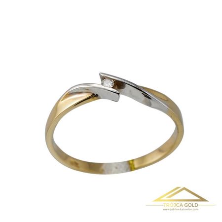 Złoty pierścionek z brylantem 0,03 ct