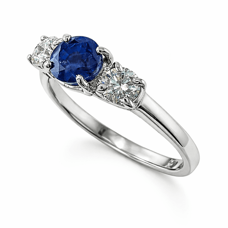 Pierścionek z szafirem w oprawie z brylantami z białego złota pr. 585, 14K